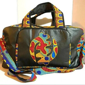 Handcrafted  unisex Ankara print vinyl leather duffel weekend travel bag